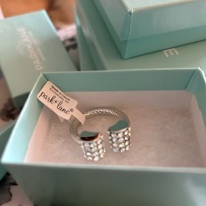 The Empire Ring from Park Lane in a size 9, fits TTS. Brand new with tag.